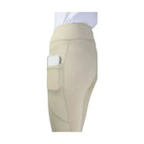 Beige high-waisted hy equestrian selah competition riding tights with a side pocket holding a smartphone