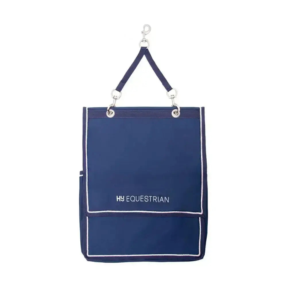 Navy blue hy equestrian show kit bag with white stitching and silver hardware perfect for riding apparel storage