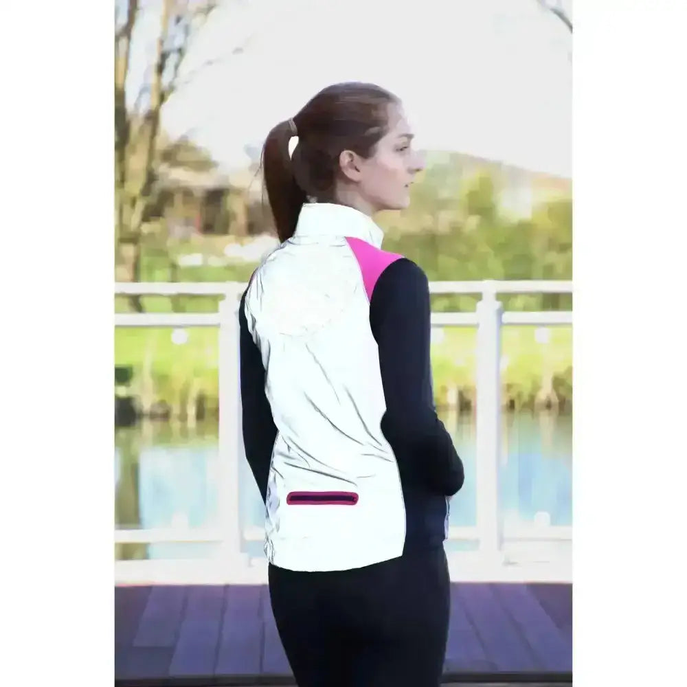 White reflective vest with pink shoulder panels and magenta zipper pull from hy equestrian silva flash two tone reflective gilet