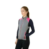 Gray and pink hy equestrian silva flash two tone reflective gilet with black long sleeves underneath for riding comfort