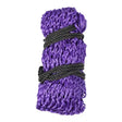 A tightly coiled purple mesh slow flow haynet secured with black braided rope for slow hay consumption in equestrian use