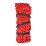 A vibrant red knitted mesh equestrian slow flow haynet roll secured with black twisted rope for slow hay consumption