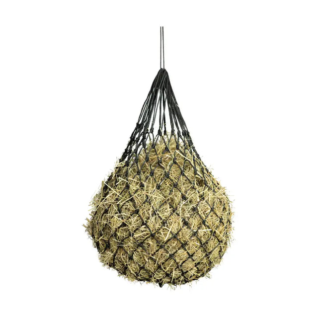 A black woven equestrian slow flow mini haynet filled with light green hay hanging by a single string for lib forage controlled feeding