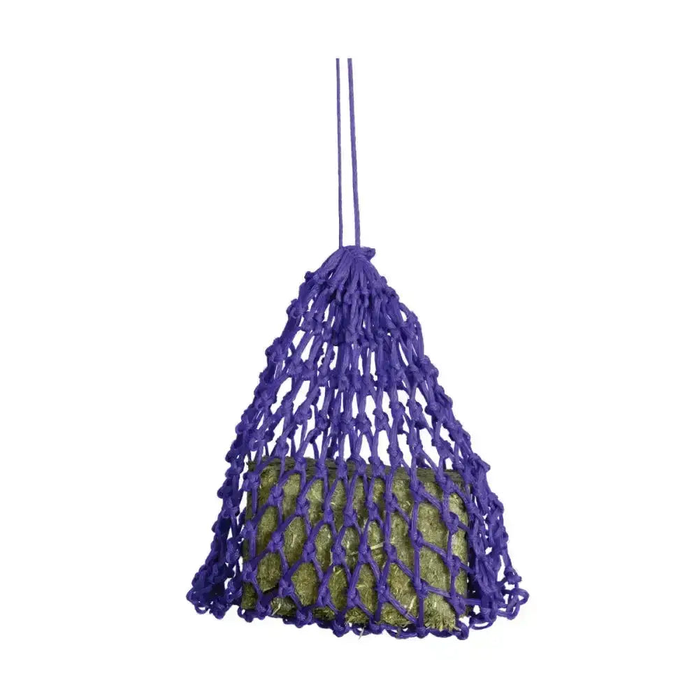 Purple knitted mesh equestrian slow flow snack haynet holding green textured forage block for slow feeding