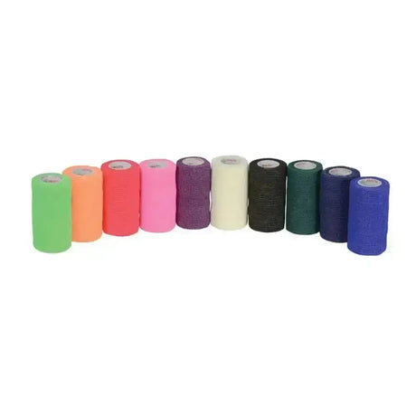 A row of colorful hy equestrian sportwrap flexible bandages in green orange pink purple white black teal navy and blue