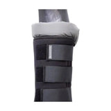 Black padded hy equestrian stable protection boot with gray fleece lining and adjustable velcro straps to wick moisture
