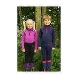 Two kids wearing hy equestrian stella funky base layer outfits in purple and navy with star leg warmers and hat cover perfectly