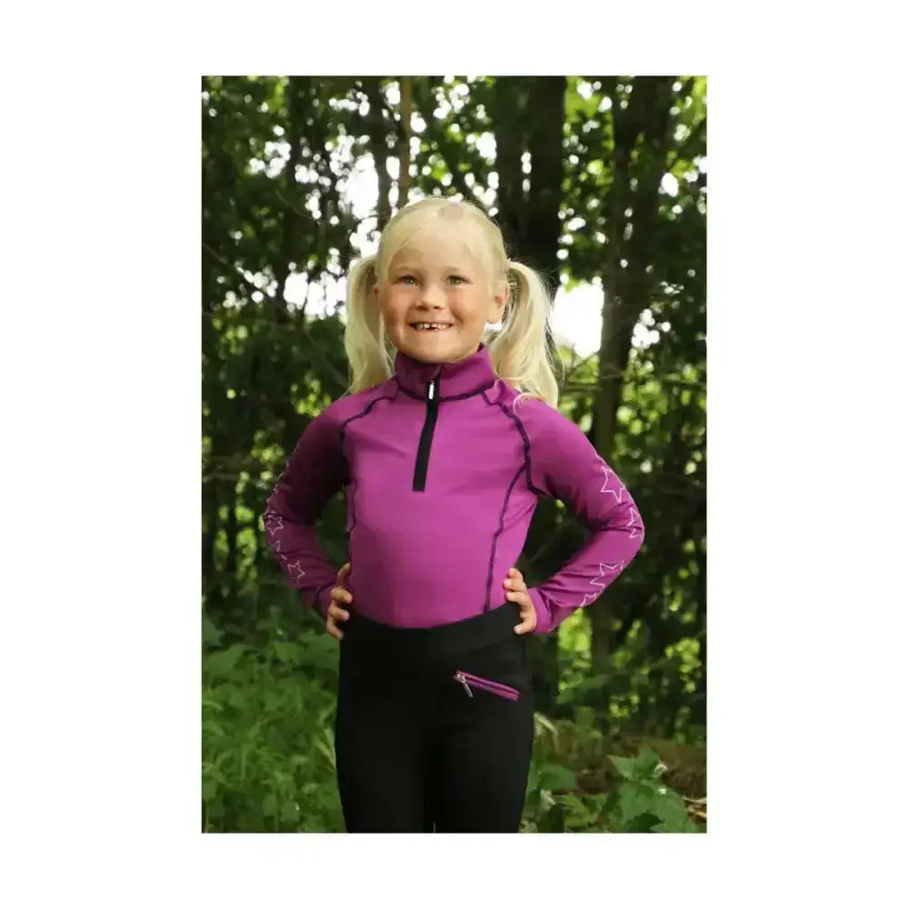 Vibrant purple equestrian stella funky base layer with star patterns and black zipper perfect for kids active wear