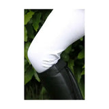 Black leather riding boot with side zipper worn over white leggings showing stella children’s riding tights