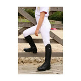 Black leather riding boots with polished finish and subtle stitching perfect for equestrian stella children’s riding tights