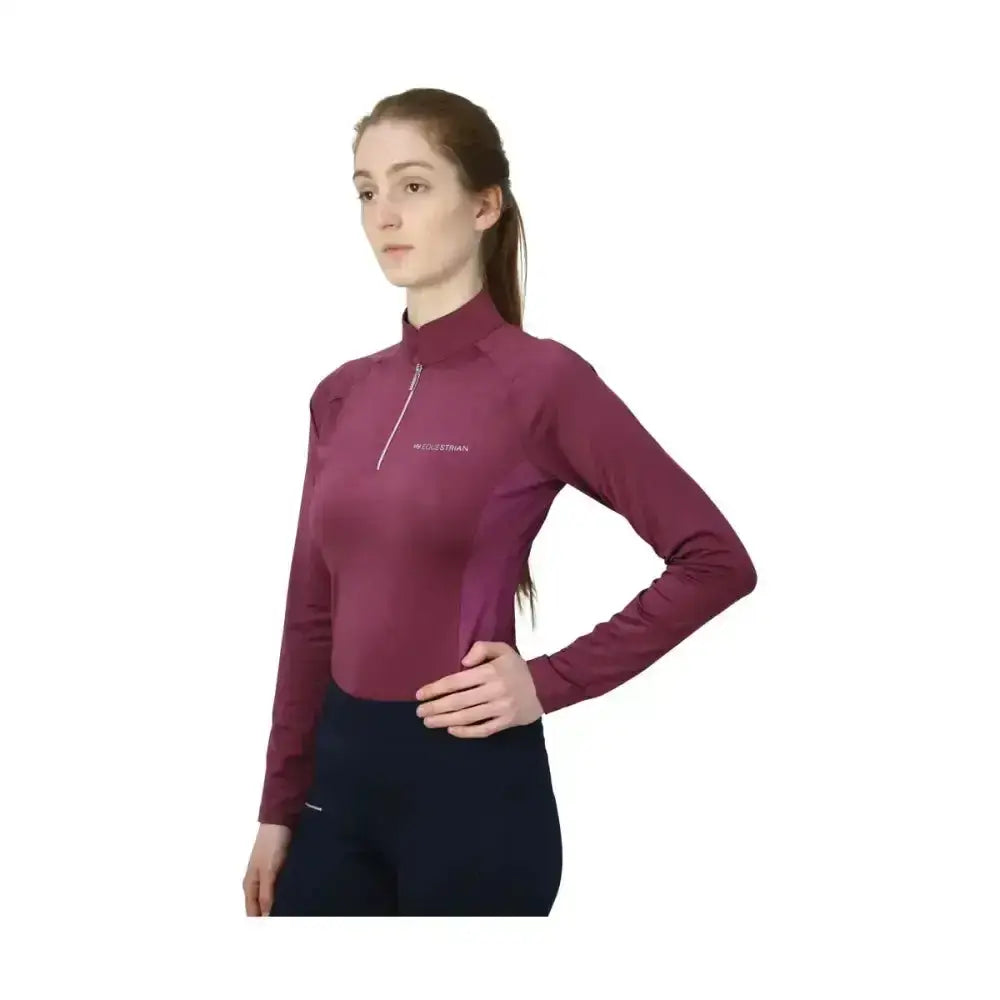 A maroon long-sleeved equestrian synergy base layer with high collar and horseman logo for the equestrian athlete