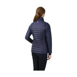 Navy blue quilted fabric with high collar and subtle logo on shoulder on the equestrian synergy padded jacket