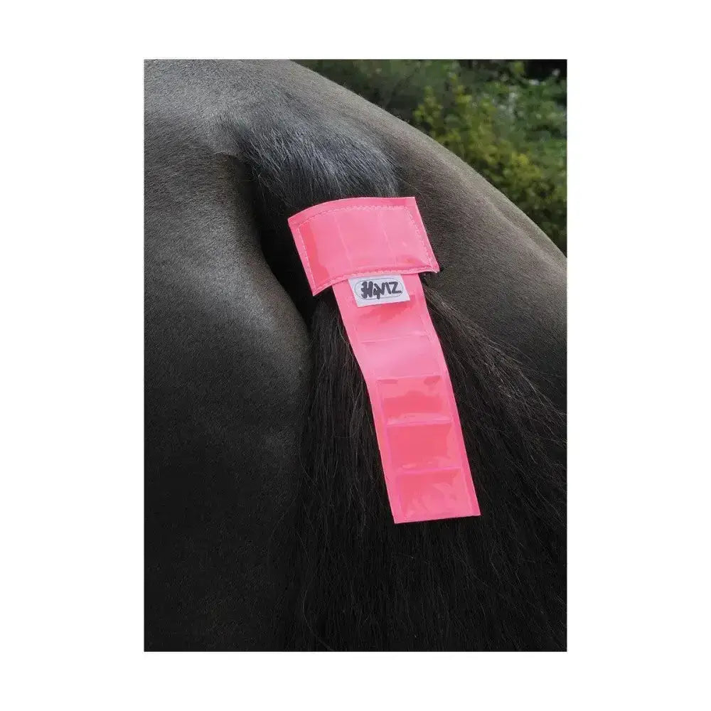 Bright pink reflective equestrian tail band with white hayz label designed as a tail guard for horse’s tail