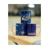 Blue ceramic mugs with white handles featuring classic thelwell character from the equestrian thelwell collection