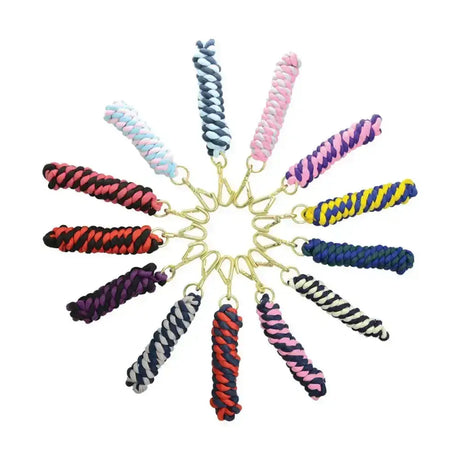 A collection of colorful braided equestrian two tone twisted lead rope keychains in vibrant combinations