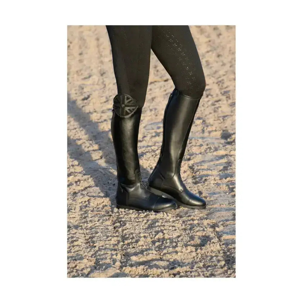 Black leather hy equestrian union jack riding boots with glossy finish and decorative circular buckles patriotic riding boots