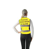 Back of bright yellow hyviz equestrian waistcoat with reflective stripes and pass wide and slow black text by hy equestrian