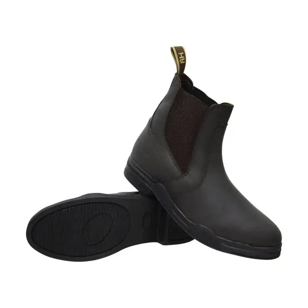 Back view of hy equestrian wax leather black leather jodhpur boot with gold pull tab for easy wear