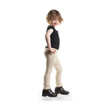 Child wearing beige equestrian zeddy tots jodhpurs with a black top and ankle boots showcasing pull-on tots jodhpur style