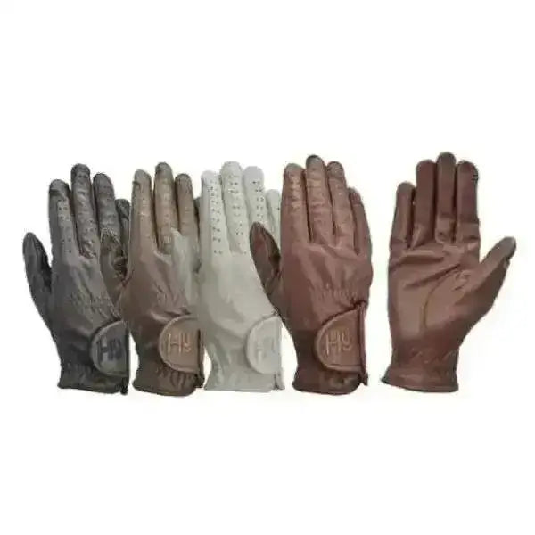 A pair of brown leather childs riding gloves with subtle texture and stitched detailing ideal for riding use