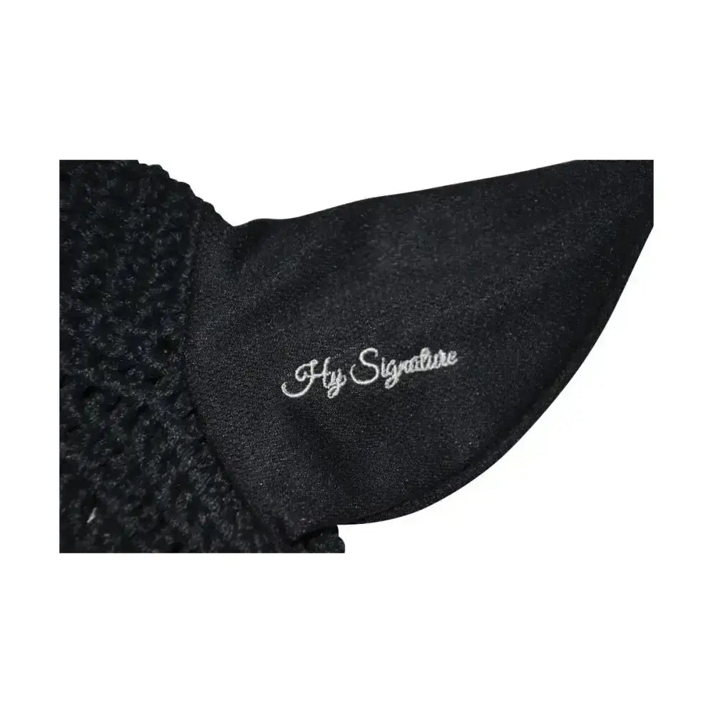 Black textured fabric collar with white embroidered my signature script on hy signature fly veil horse ear bonnet