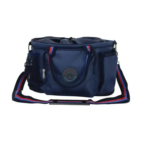 Navy blue hy signature grooming bag with sturdy design red and white striped strap and mesh side pockets for kit tidy