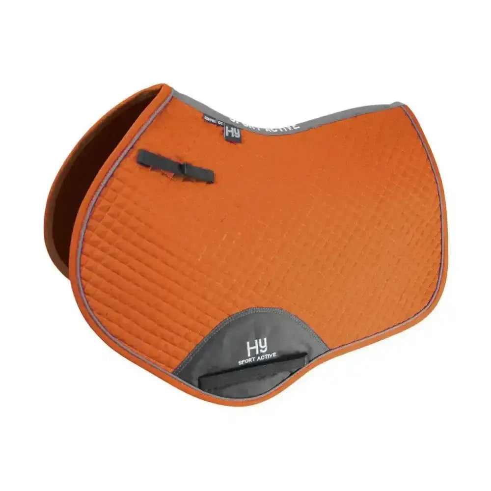 Orange hy sport active close contact saddle pad with textured surface and gray trim for active close contact use