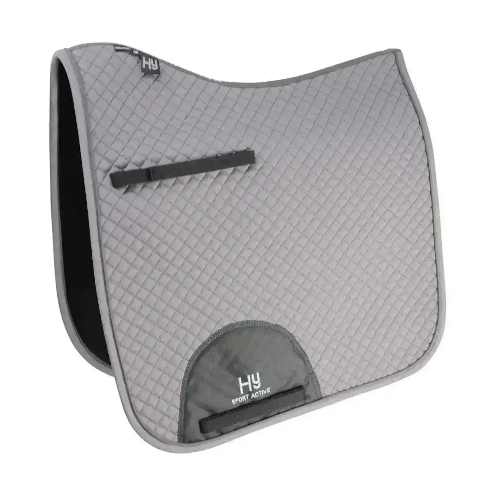 Gray quilted hy sport active dressage saddle pad with black trim and signature hywither cut patch for sport active dressage
