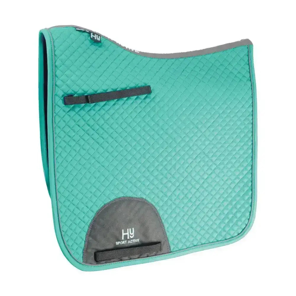 Teal quilted hy sport active dressage saddle pad with gray accents and black straps for sport active dressage use