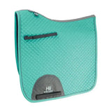 Teal quilted hy sport active dressage saddle pad with gray accents and black straps for sport active dressage use