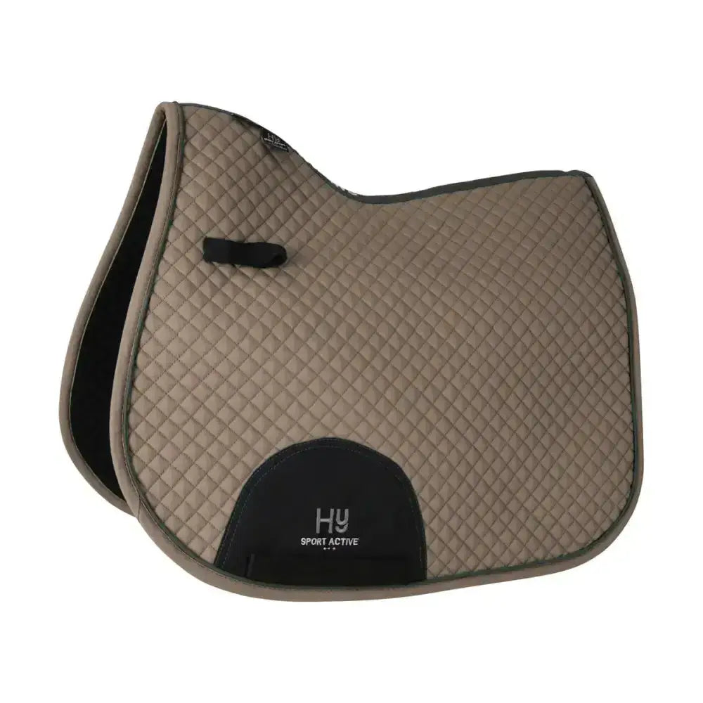 Tan quilted classic shaped general purpose saddle pad with black trim and branded logo patch for active gp saddle use