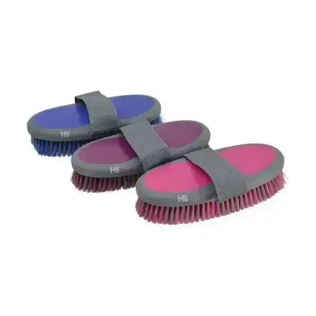 Three hy sport active groom body brushes with gray straps and colorful rubberized handles in blue purple and pink