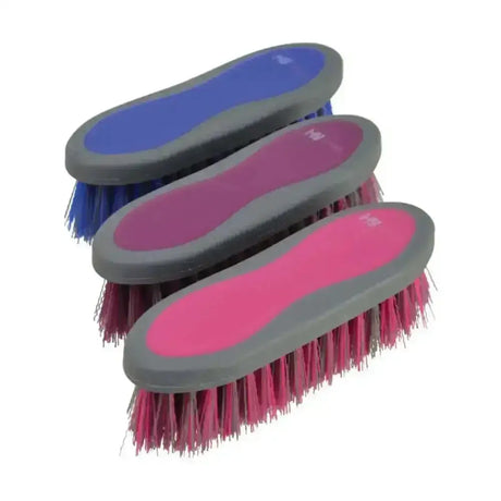 Three colorful hy sport active groom dandy brushes with ergonomic gray handles and vibrant rubberized tops