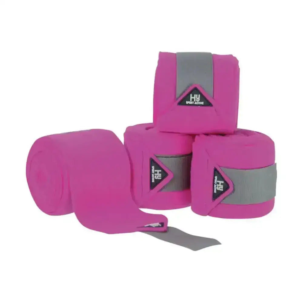 Bright pink hy sport active luxury bandages with gray reflective strip and black logo designed for active use