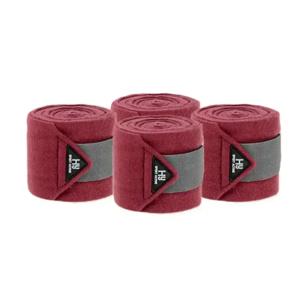 Set of four maroon felt active luxury bandages with gray elastic bands and black branding labels for sport use