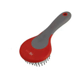 Red and gray helly hansen sport active mane and tail brush with round head and black bristles for grooming horses