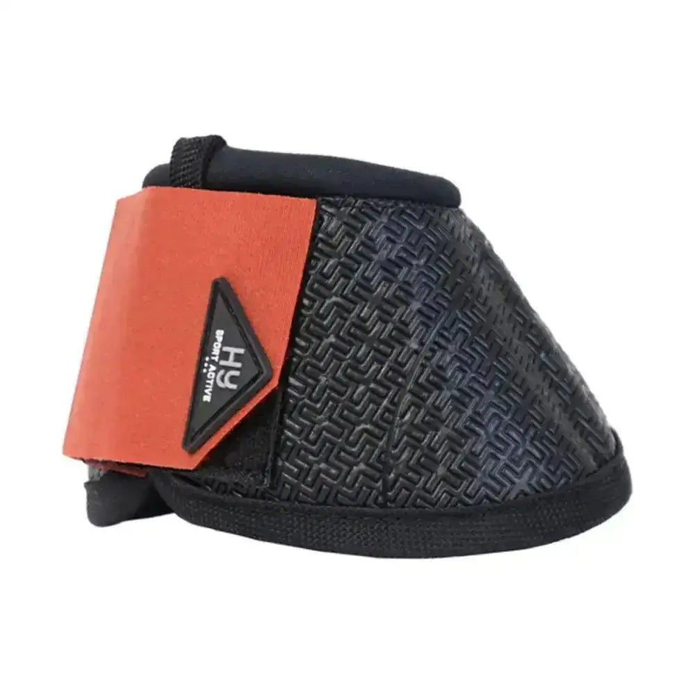 Black and orange hy sport active over reach boots with textured pattern and adjustable strap from horse active active colour collection