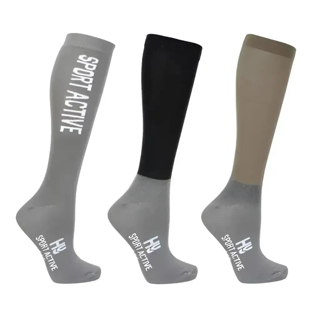 Three pairs of hy sport active riding socks in gray black and beige with sport active branding perfect for active riding