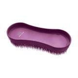 Purple plastic horse brush with dense dark bristles and smooth handle from hy sport miracle grooming brushes