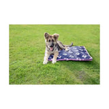 Navy blue unicorn dog bed with white paw prints and pink trim for a fun unicorn themed cozy spot