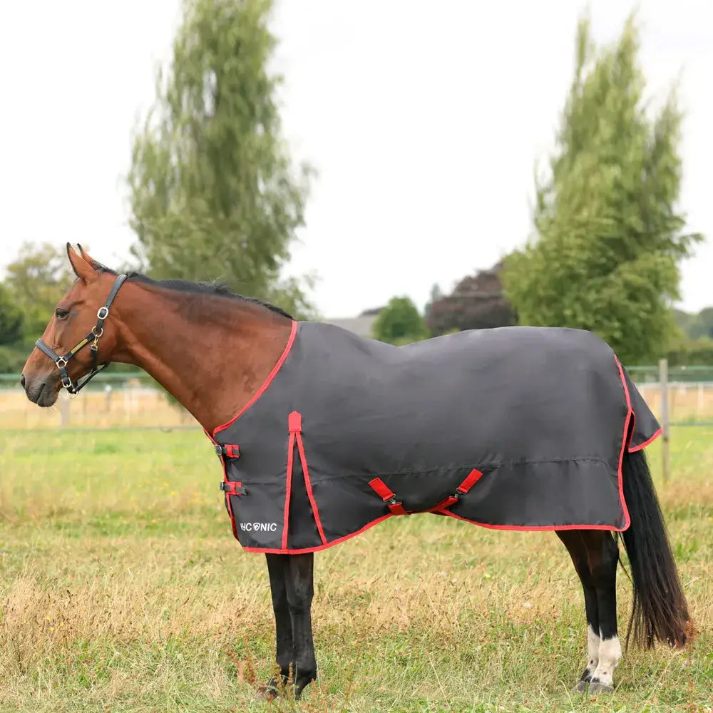 Black hyconic 0g turnout rug with red trim and adjustable straps charcoal waterproof denier super lightweight turnout