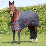 Dark gray quilted hyconic 100g stable rug with red trim black buckles and branded label designed for horses