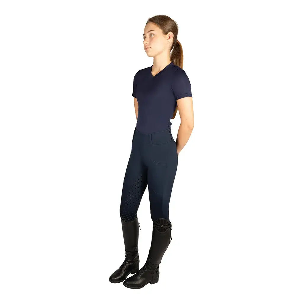 Navy blue hyconic children’s torrellas riding tights with subtle textured panels on the thighs for performance riding