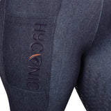 Dark blue denim hyconic valloria denim riding tights with subtle embossed logo and orange accent line for riding use