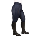 Back view of navy blue hyconic valloria denim riding tights with subtle texture and branded patch on pocket