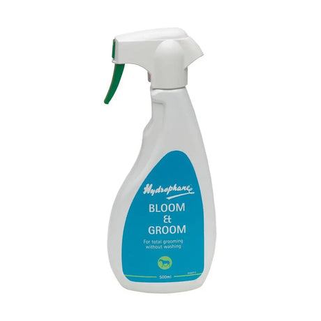 White plastic spray bottle with green trigger and teal hydrophane bloom & groom label for total grooming