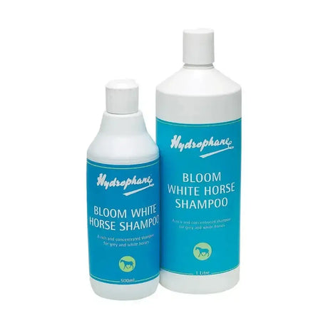 Two translucent white bottles of hydrophane bloom white horse shampoo with bright blue labels for a clean coat