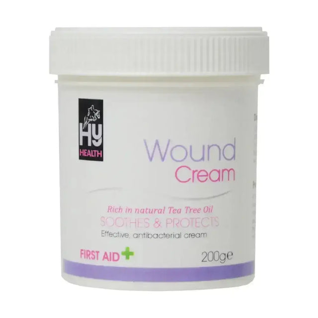 White plastic container of hyhealth wound cream labeled with pink and purple text rich in natural tea tree oil antibacterial agents