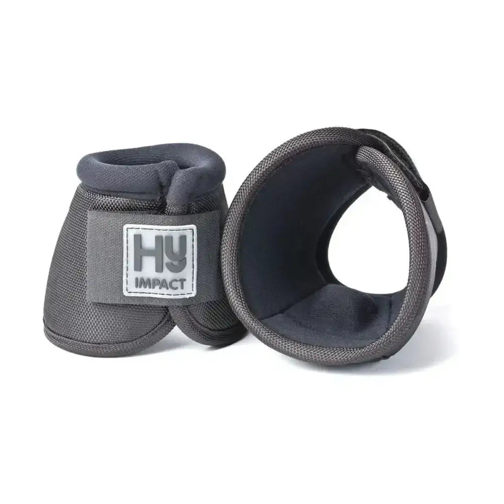 Gray hyimpact pro over reach boots with mesh exterior and padded interior featuring anti spin heel knob for stability