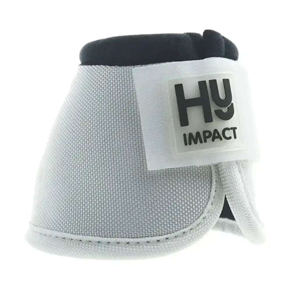 White hyimpact pro over reach boot with black interior lining and textured fabric featuring anti spin heel knob
